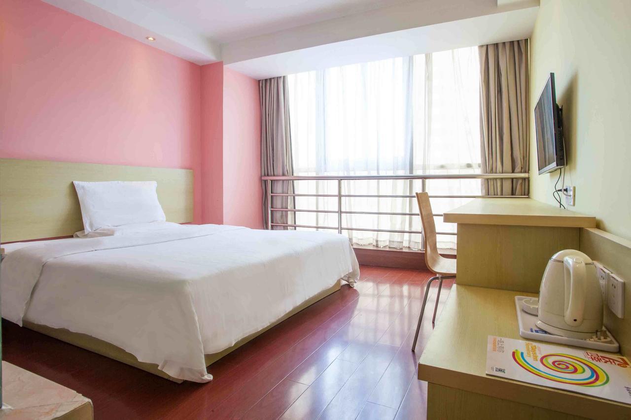 7 Days Inn Yangjiang Xinyue International Studio Phòng bức ảnh